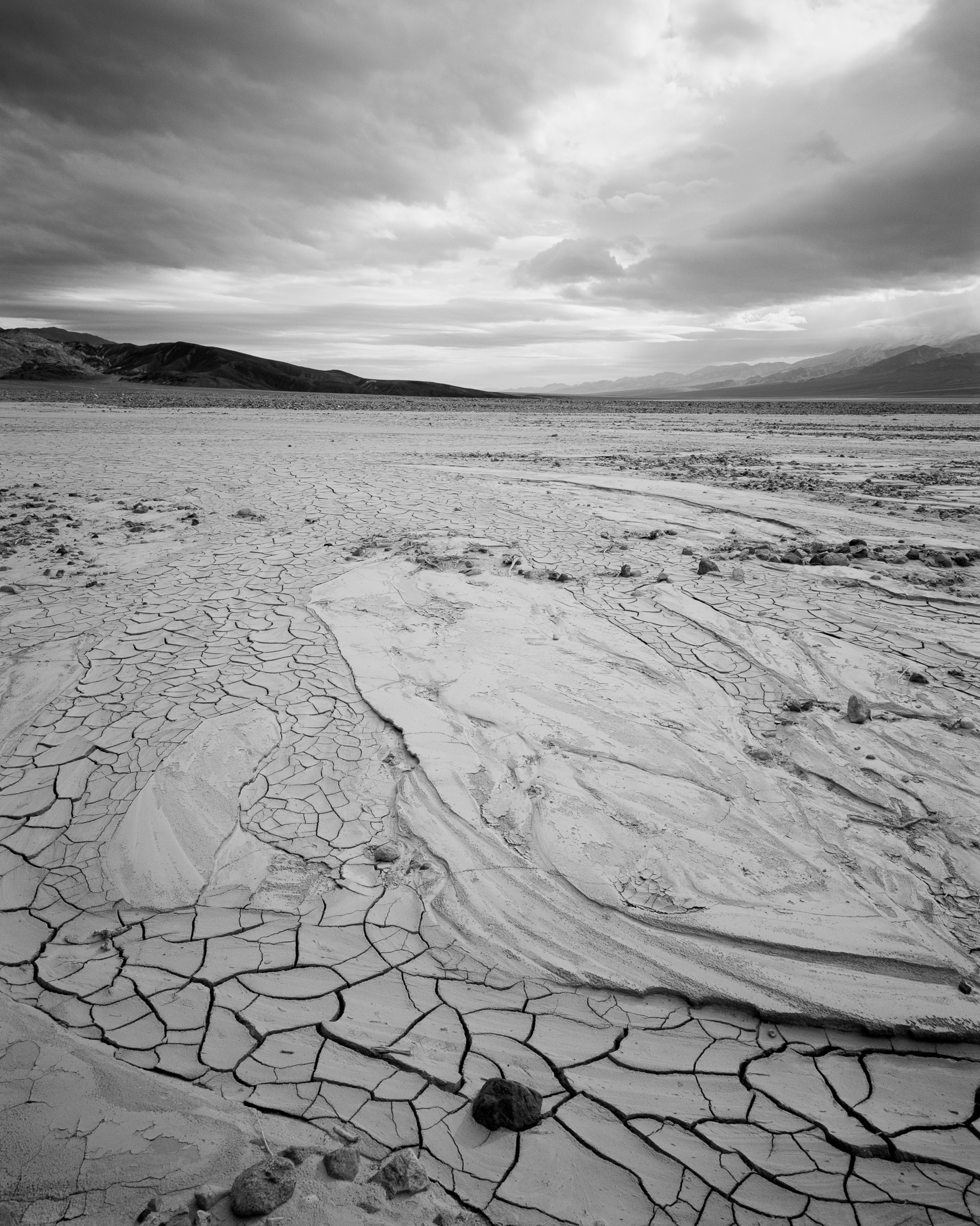 A summer storm was building over Death Valley at sunrise, California. Photograph by Marty Quinn