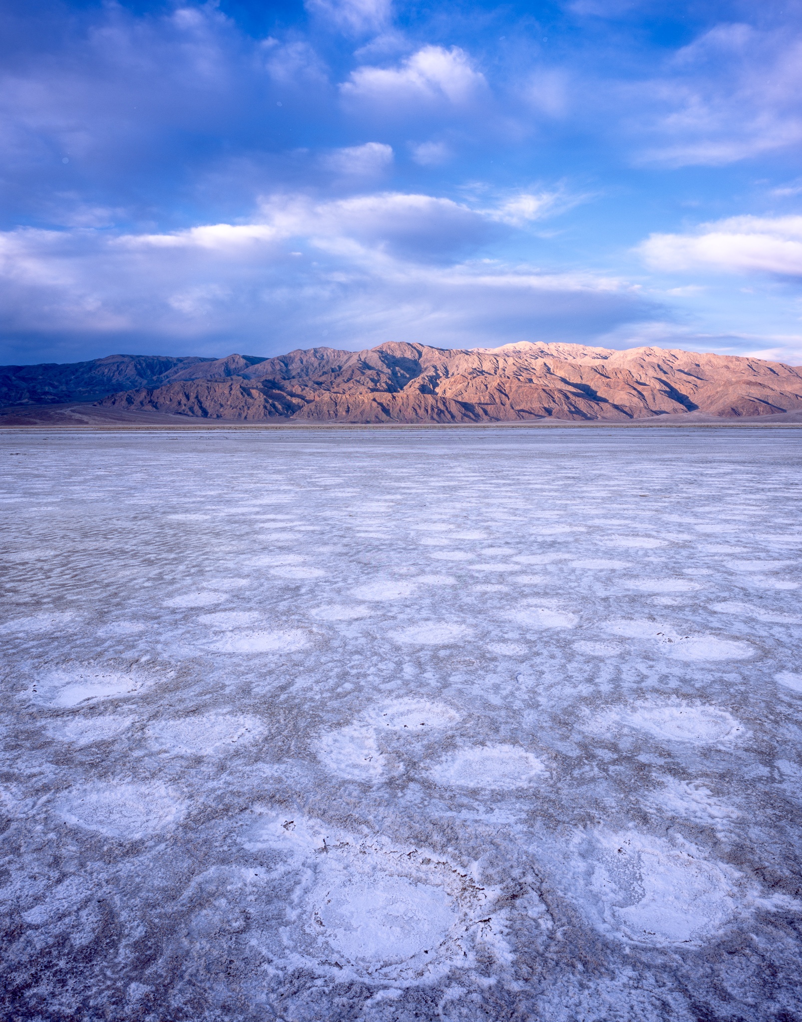 The polygons that form on Death Valley's salt flat aren't random, California. Photograph by Marty Quinn